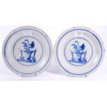 A Pair of English Delft Plates, circa 1700, painted in blue with urns of flowers within line