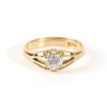 A Solitaire Diamond Ring, a round brilliant cut diamond in an extended claw setting, to a tapering