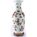 A Chinese Porcelain Baluster Vase, late 19th/20th century, with flared neck, painted in muted