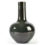 A Chinese Porcelain Bottle Vase, Kangxi reign mark but not of the period, with mottled green glazes,