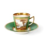 A Rockingham Porcelain Coffee Cup and Saucer, circa 1830, painted with a lakeland scene in a gilt