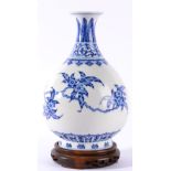 A Chinese Porcelain Pear Shaped Vase Yongzheng mark but not of the period, painted in underglaze