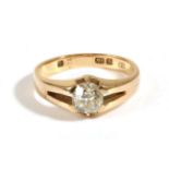 An 18 Carat Gold Solitaire Diamond Ring, an old cut diamond in an extended claw setting, to a