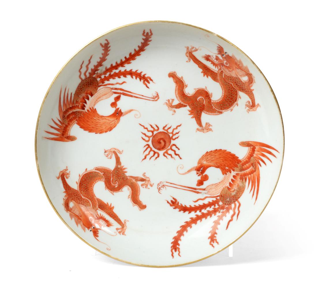 A Chinese Porcelain Saucer Dish, Jiaqing reign and possibly of the period, painted in red monochrome