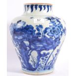 A Chinese Porcelain Baluster Jar, in 17th century style, painted in underglaze blue with foliage and