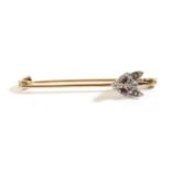 A Diamond and Ruby Fox Head Bar Brooch, pavé set with old cut diamonds and ruby cabochon eyes, to