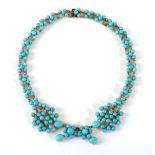 A Victorian Turquoise Necklet, of round cabochon turquoise cluster links, length 38cm . The