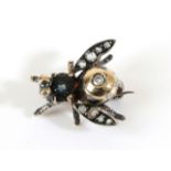 A Diamond and Zircon Fly Brooch, a domed abdomen inset with an eight-cut diamond, with rose cut