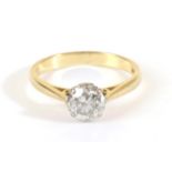 An 18 Carat Gold Solitaire Diamond Ring, an old cut diamond in a claw setting, to knife edge