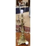 A Gilt Metal Lamp Base, late 19th century, of leaf and scroll cast baluster form, on a tricorn base,