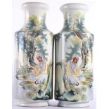 A Pair of Chinese Porcelain Vases, of cylindrical form with waisted neck, painted in famille verte