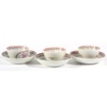 A Set of Three Lowestoft Porcelain Tea Bowls and Saucers, circa 1790, painted in colours with flower