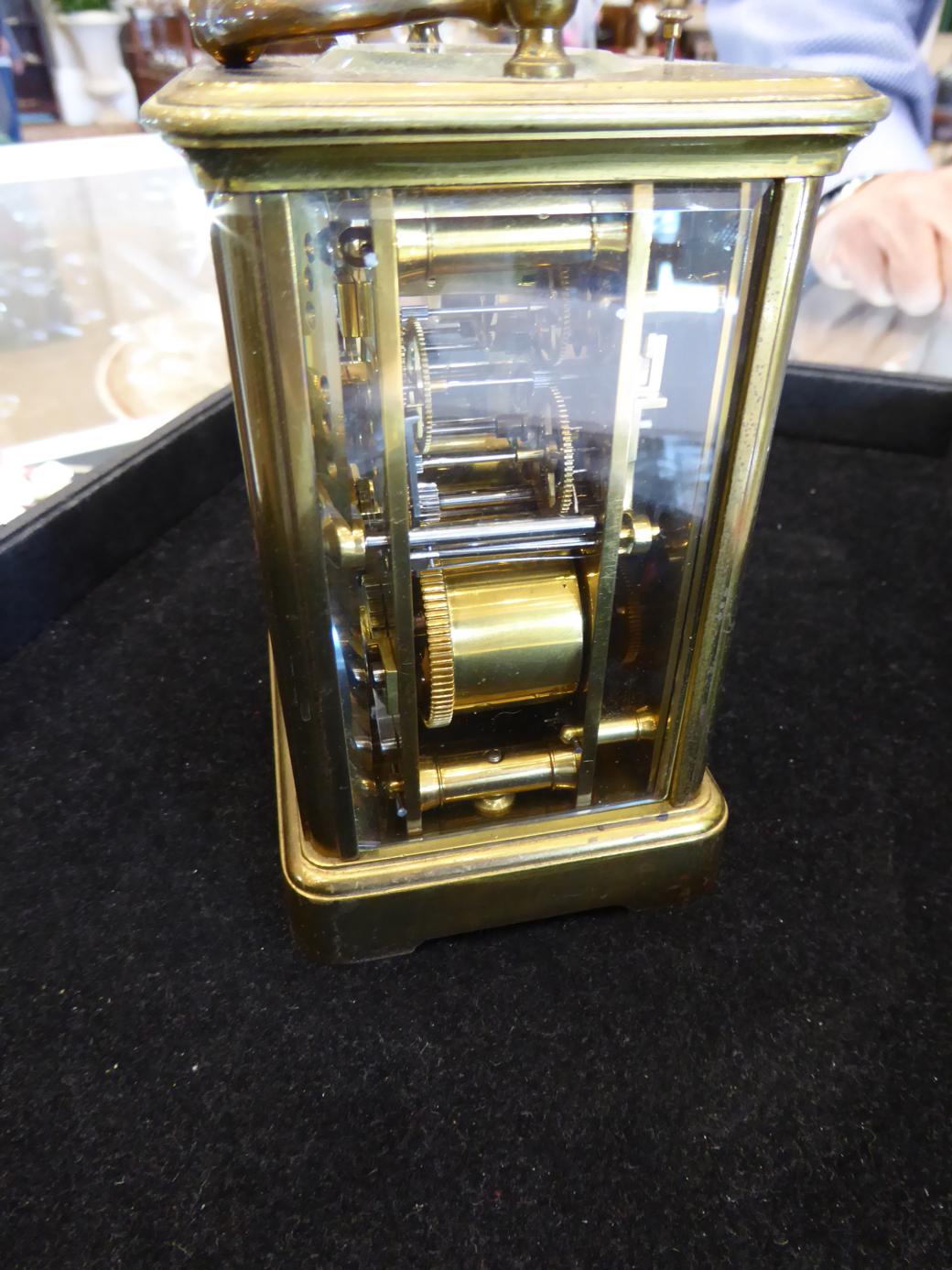 A Brass Striking and Repeating Alarm Carriage Clock, stamped for A Margaine, retailed by Howell - Image 5 of 8