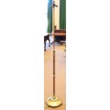 A Brass Arts & Crafts Style Adjustable Standard Lamp, fitted for electricity with two bayonet cap