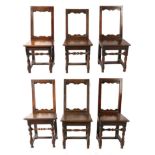 A Harlequin Set of Six Early 18th Century Joined Oak Chairs, possibly Lorraine, the boarded seats on