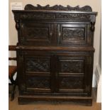 A Joined Oak Press Cupboard, initialled ASE and bearing date 1683, with carved frieze above inverted