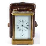 A Brass Striking and Repeating Alarm Carriage Clock, stamped for A Margaine, retailed by Howell