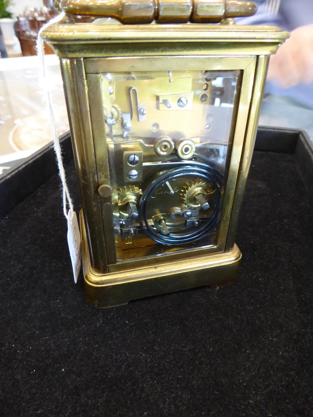 A Brass Striking and Repeating Alarm Carriage Clock, stamped for A Margaine, retailed by Howell - Image 4 of 8