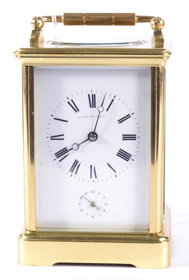 A Brass Carriage Timepiece with Alarm, retailed by Joseph Penington, circa 1890, carrying handle,