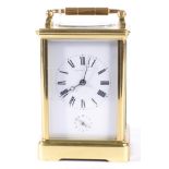 A Brass Carriage Timepiece with Alarm, retailed by Joseph Penington, circa 1890, carrying handle,