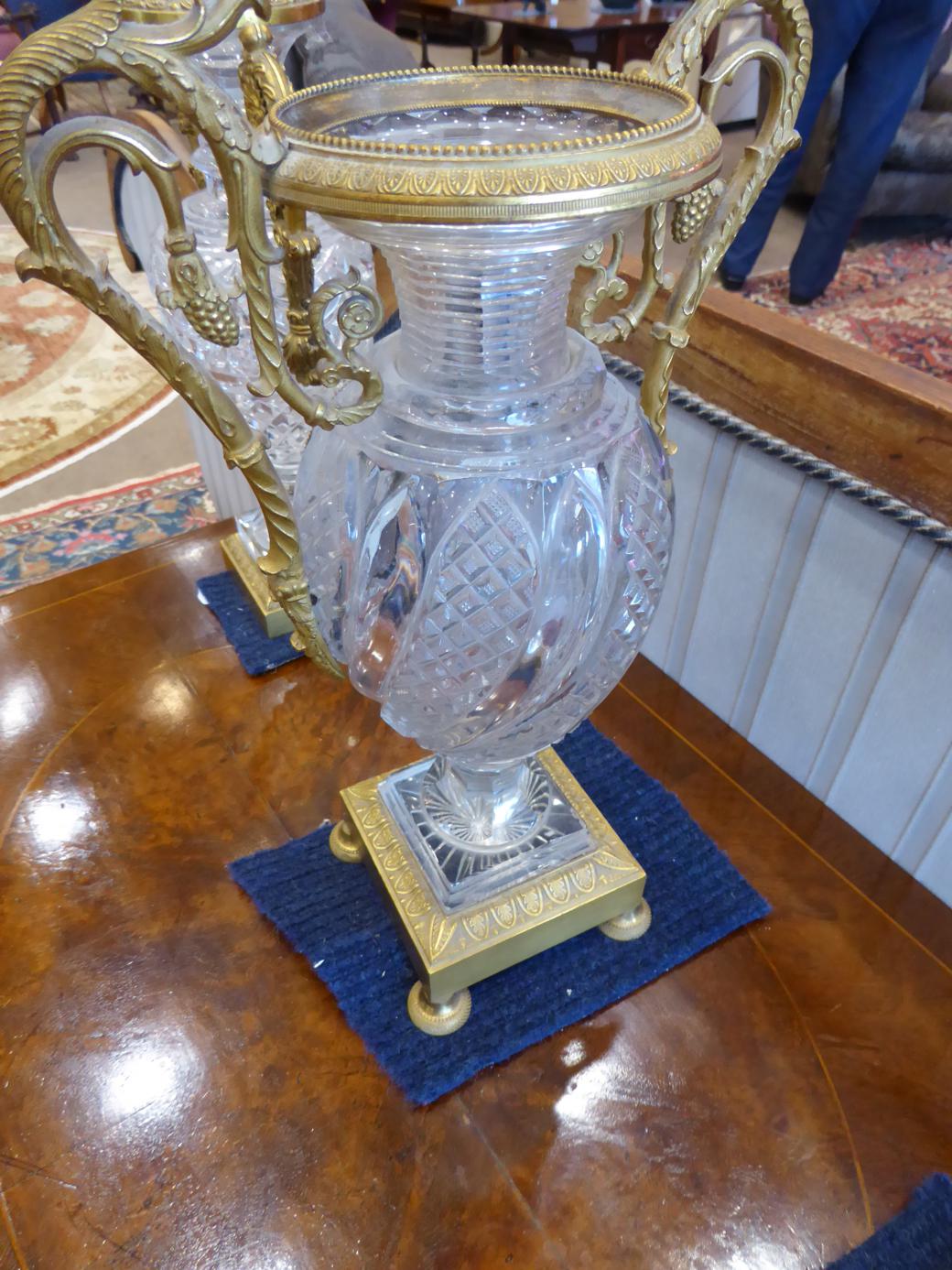 An Ormolu and Cut Glass Mantel Timepiece with Garniture, 19th century and later, urn shaped cut - Image 3 of 12