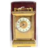 A Brass Paste Set Carriage Timepiece, circa 1900, carrying handle, paste set front borders and