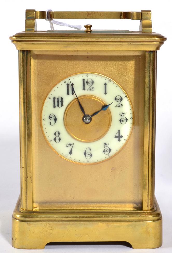 A Brass Striking and Repeating Carriage Clock, circa 1900, carrying handle and repeat button, enamel