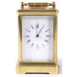 A Brass Striking and Repeating Carriage Clock, retailed by Hry Marc, Paris, circa 1890, carrying