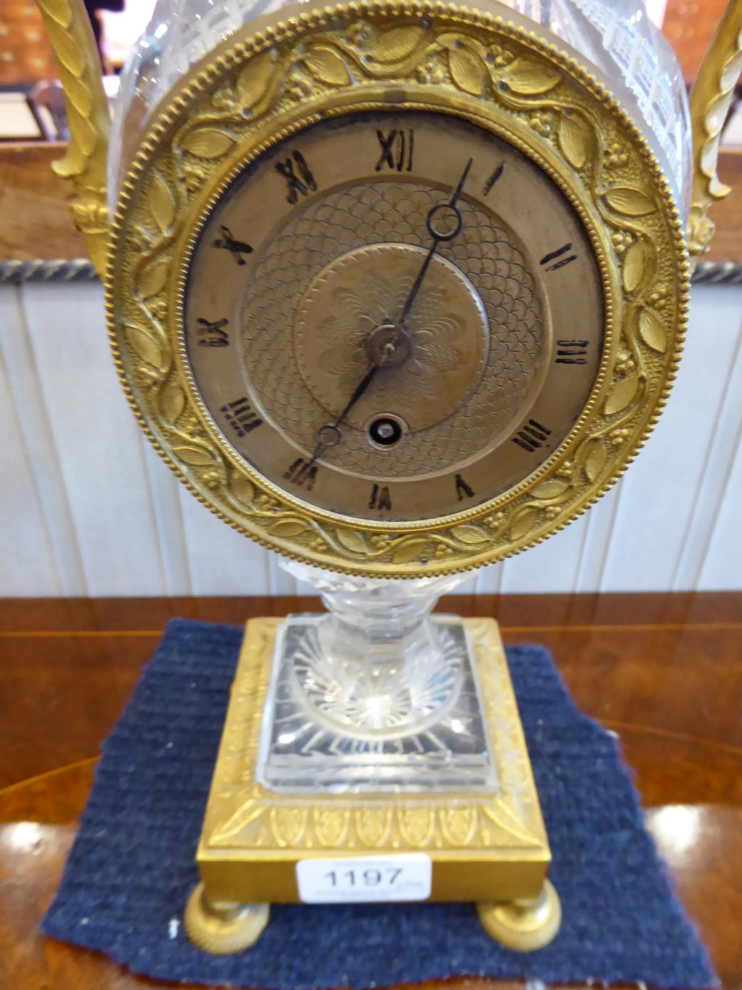 An Ormolu and Cut Glass Mantel Timepiece with Garniture, 19th century and later, urn shaped cut - Image 8 of 12