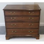 A George III Mahogany Straight Front Chest, circa 1800, the moulded top above four graduated