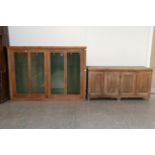 A Late 19th Century Glazed and Sliding Door Pine Cabinet, the interior lined in green fabric and