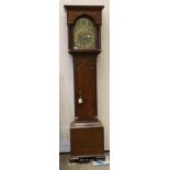 An Oak Eight Day Longcase Clock, flat top pediment, arched trunk door, 12-inch arched brass dial