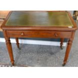 A Victorian Mahogany Writing Table, circa 1870, with a green and gilt leather writing surface