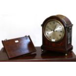 A Mahogany Striking Table Clock, triple pad pediment, side carrying handles and pierced sound frets,