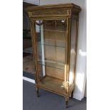 A Late 19th/Early 20th Century Gilt and Gesso Vitrine, the moulded top above a glazed door with