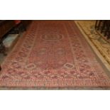 Beshir Carpet Central Oxus Region, mid 19th century The brick red diamond lattice field of