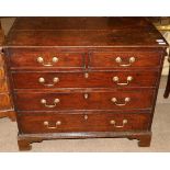 A George III Oak Straight Front Chest of Drawers, 3rd quarter 18th century, of two short over