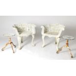 A Pair of Late Victorian White Painted Cast Iron Garden Armchairs, circa 1900, the scrolled arm