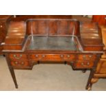 A George III Style Mahogany Carlton House Desk, early 20th century, labelled J W Mansell Ltd,