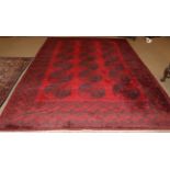 Turkmen Carpet North West Afghanistan, 20th century The crimson field with three rows of elephant