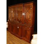 A 20th Century Mahogany, Satinwood Banded and Ebony Strung Breakfront Bookcase, the four astragal