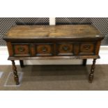 A Joined Oak Dresser, of small proportions, with two moulded drawers above a moulded base, on