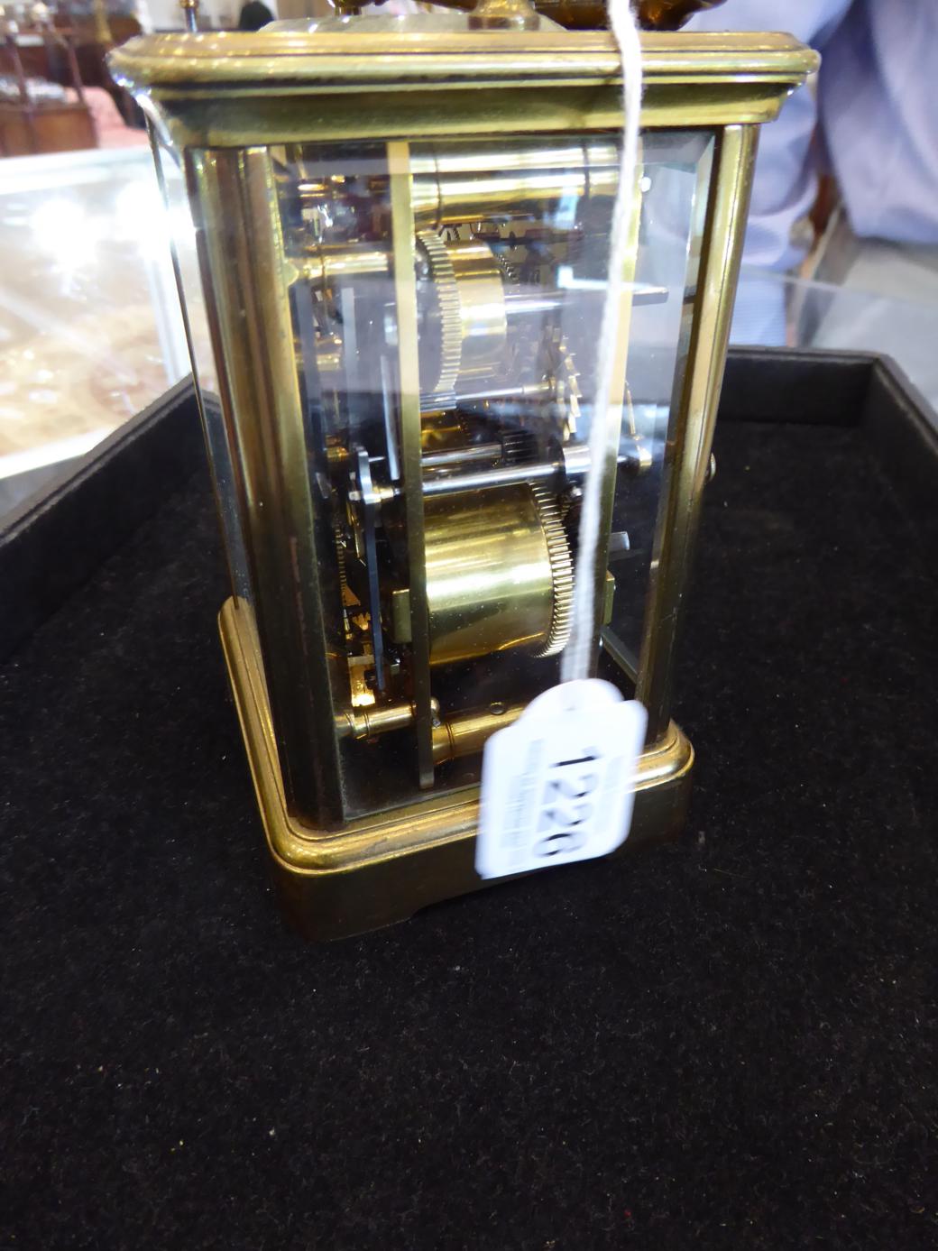 A Brass Striking and Repeating Alarm Carriage Clock, stamped for A Margaine, retailed by Howell - Image 3 of 8