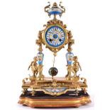 A Gilt Metal and Porcelain Mounted Striking Mantel Clock, circa 1890, surmounted by an urn finial,