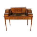 An Edwardian Mahogany and Marquetry Inlaid Carlton House Desk, early 20th century, with sliding