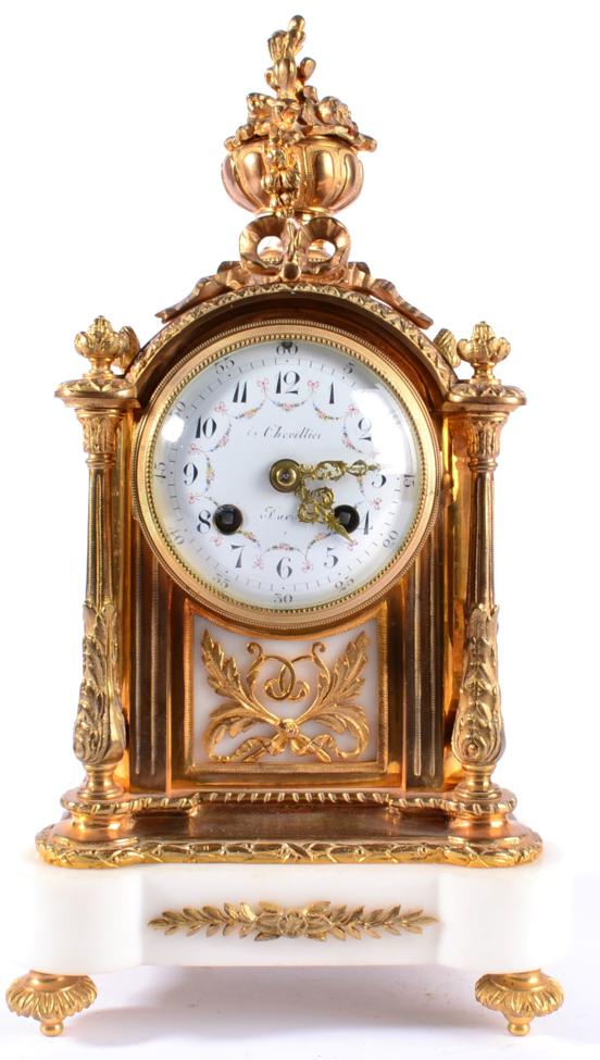 A Gilt Metal and White Marble Striking Mantel Clock, retailed by Cheriller, Paris, circa 1900,