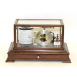 Lawrence & Mayo (London) Barograph with eight vacuum sections, circular dial indicting current