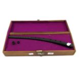 Cornettino replica instrument made from black resin, engraved 'C.W. Monk Pat. No. 1209814', in