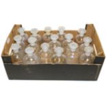 Glass Chemical Jars a collection of 16 clear glass examples with etched labelling, all with