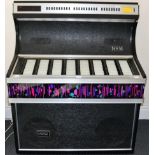 NSM Prestige 160 Juke Box playing 45rpm singles, with alpha-numeric selector (A-V and 1-8), 180